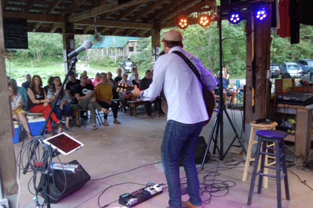 Etwell Concert Series with performer on stage