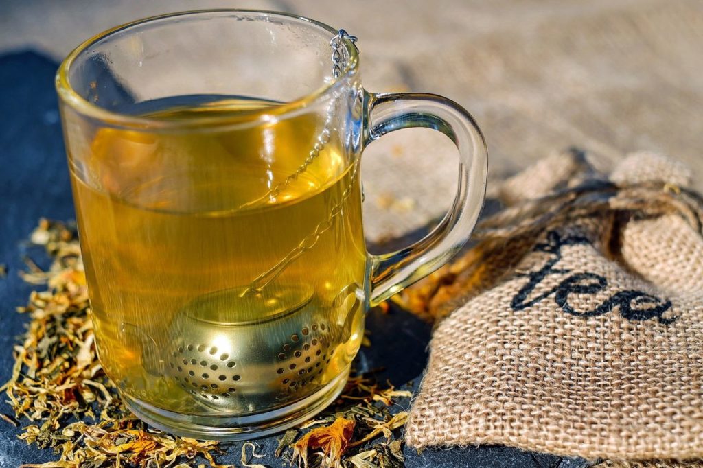 Soul Sistas Café tea cup and steeped tea